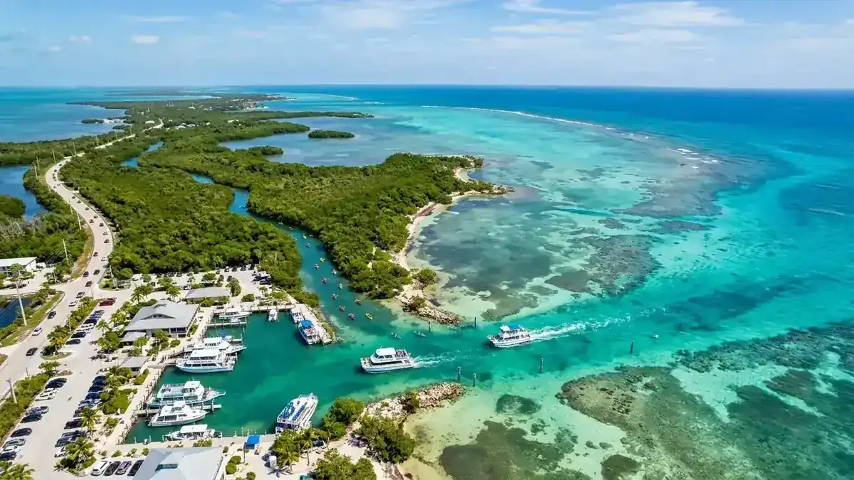 Aerial view of John Pennekamp Coral Reef State Park marina and turquoise mangrove channels in Key Largo